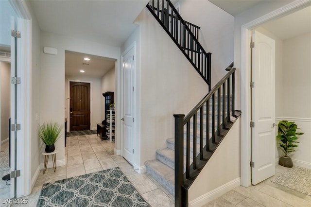 view of tiled foyer entrance