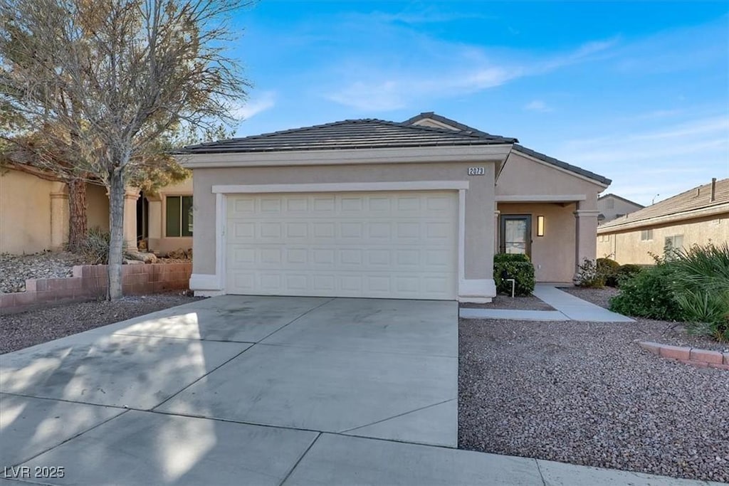 single story home featuring a garage