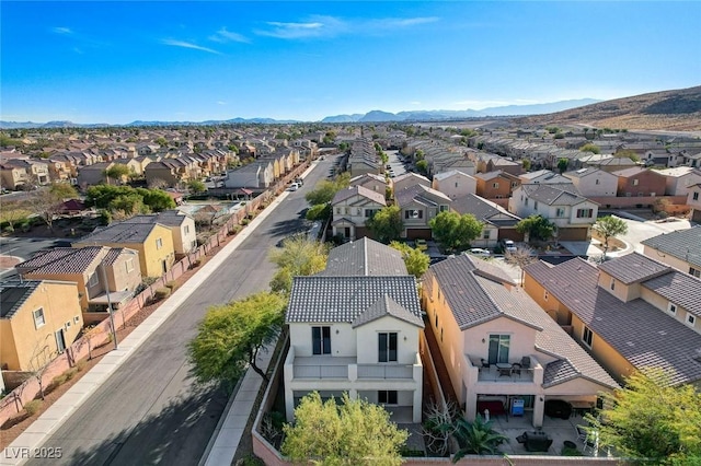 bird's eye view with a mountain view and a residential view