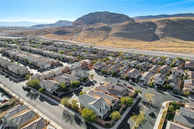 bird's eye view featuring a mountain view and a residential view