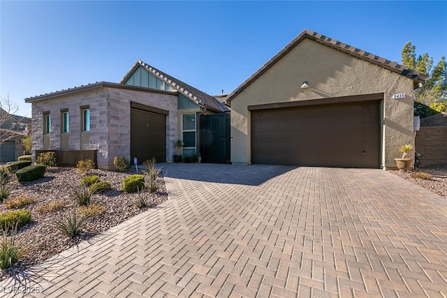 view of front of property with a garage