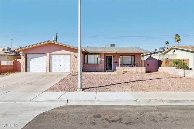 ranch-style home featuring a garage