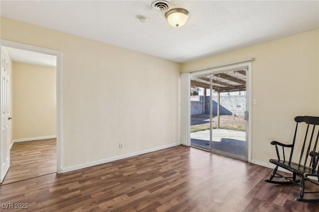 unfurnished room with dark hardwood / wood-style floors