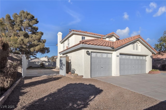 view of property exterior with a garage