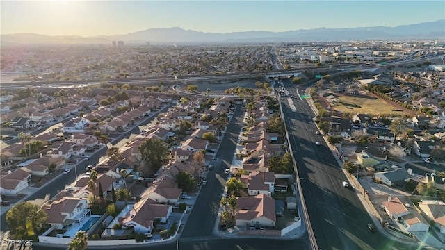 birds eye view of property featuring a mountain view