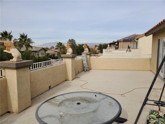 view of patio featuring a mountain view