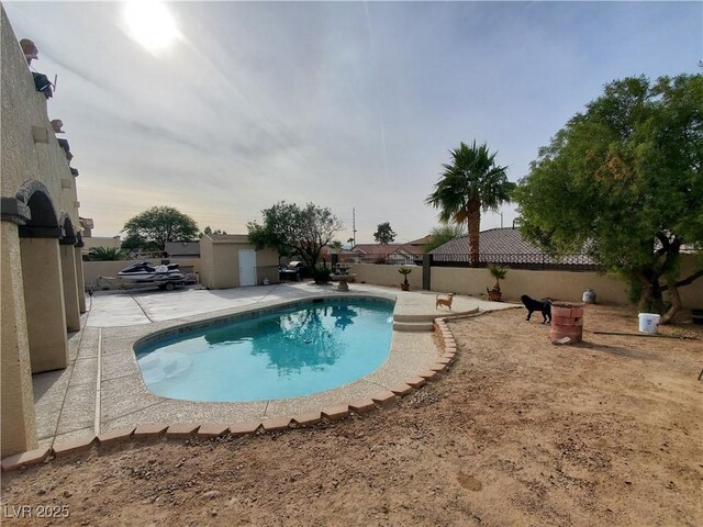 view of pool with a patio area