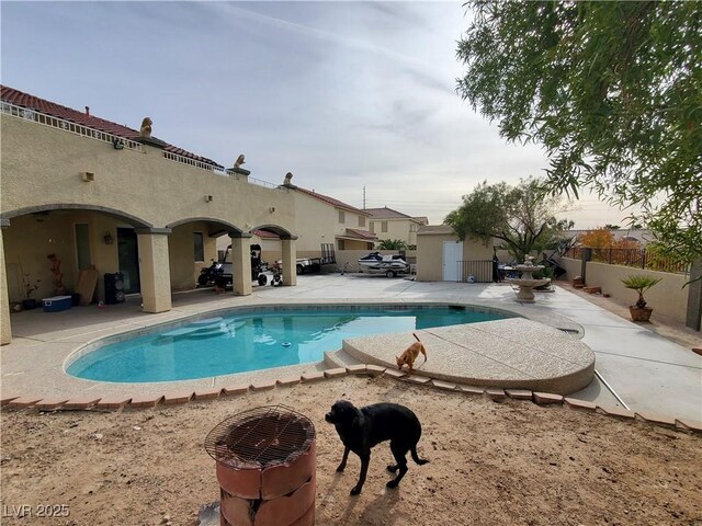 view of pool with a patio area