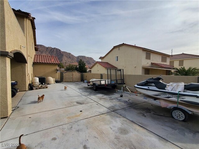 view of patio featuring central AC and a mountain view