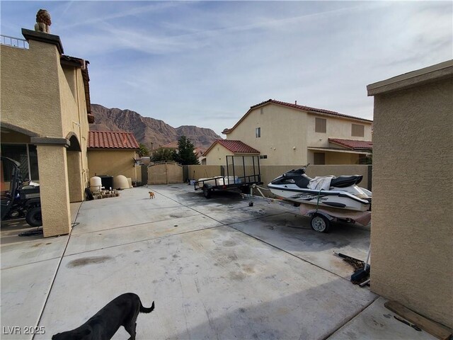 view of patio / terrace featuring a mountain view