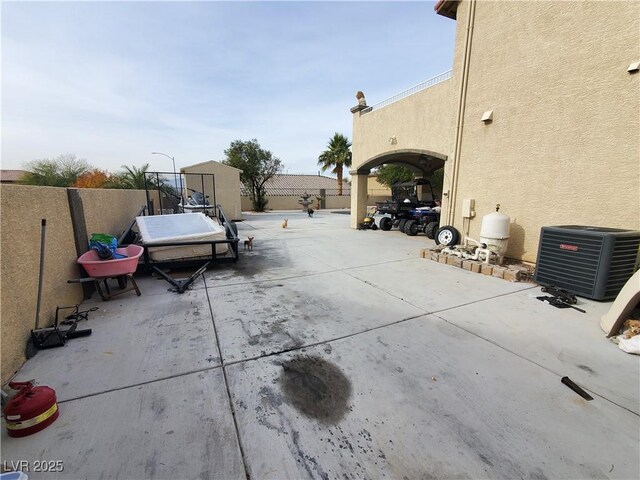 view of patio with central AC