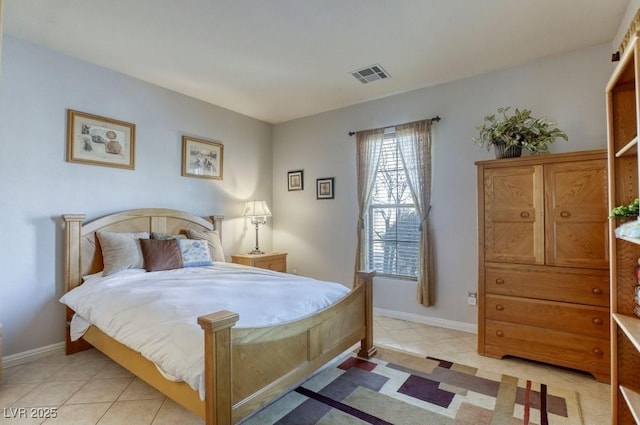 bedroom featuring light tile patterned floors