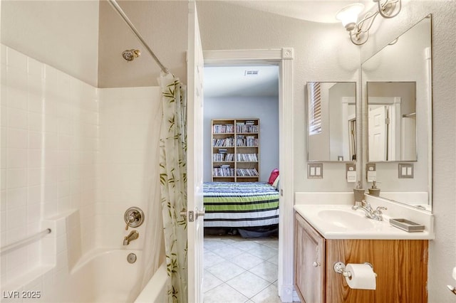 bathroom with vanity, shower / bath combination with curtain, and tile patterned flooring