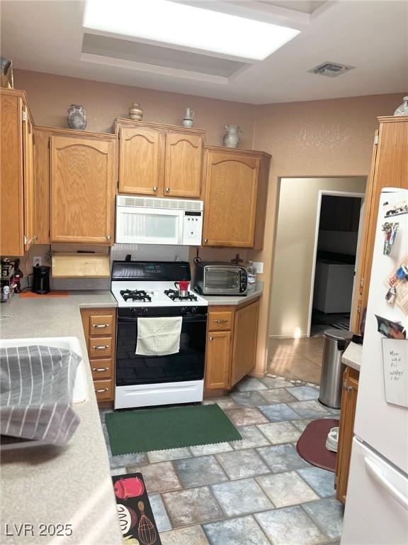 kitchen with white appliances