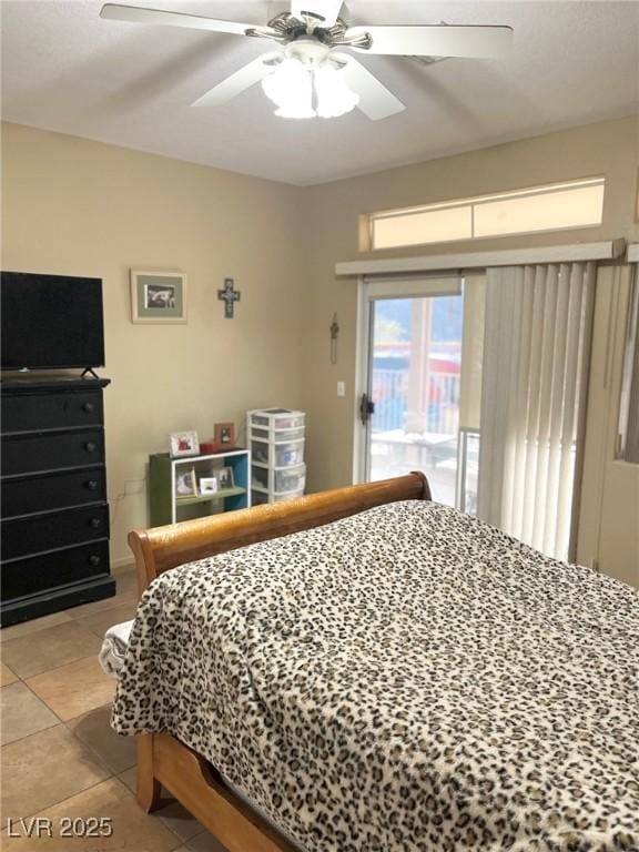 tiled bedroom featuring access to outside and ceiling fan