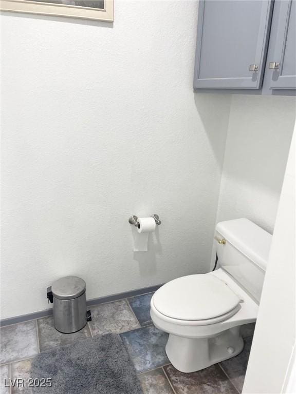 bathroom featuring toilet