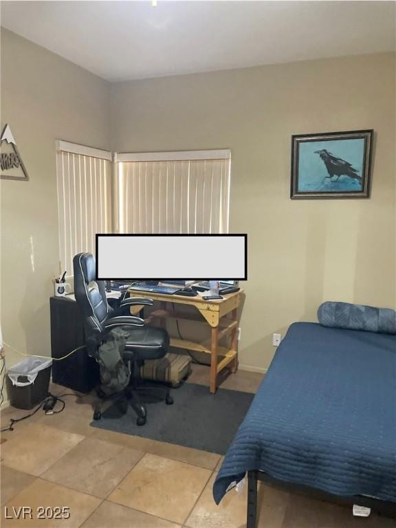 bedroom with tile patterned floors