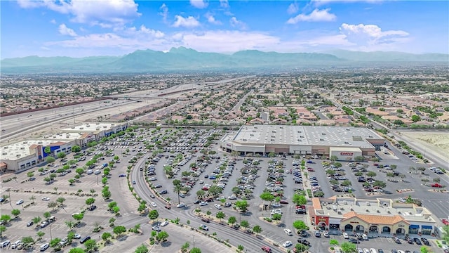 drone / aerial view featuring a mountain view