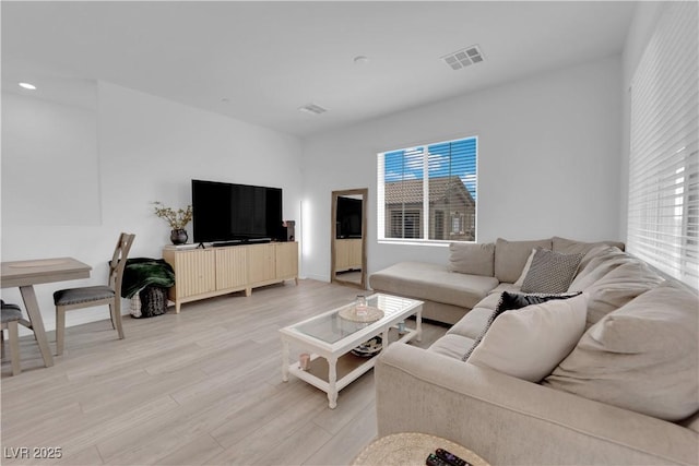 living room featuring light wood-type flooring