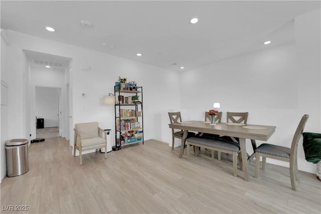 dining room featuring light hardwood / wood-style floors