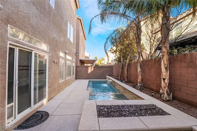 view of pool with pool water feature