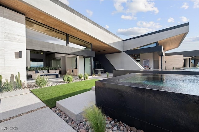 view of yard featuring a patio and an outdoor hangout area