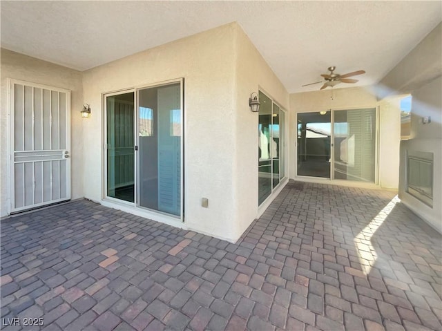 view of patio with ceiling fan