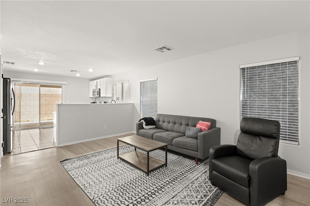 living room featuring light hardwood / wood-style flooring