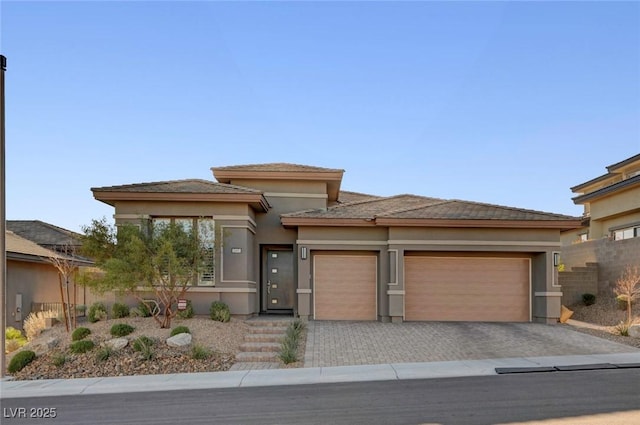 prairie-style house with a garage