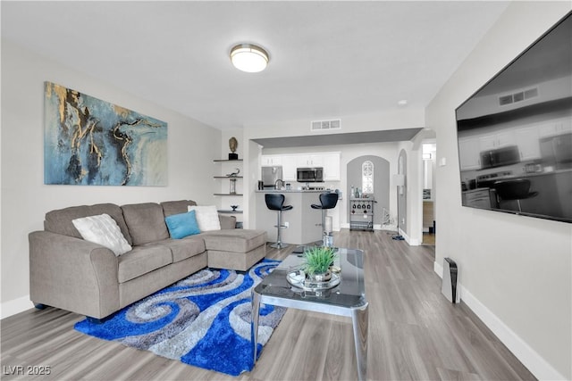 living room with hardwood / wood-style floors