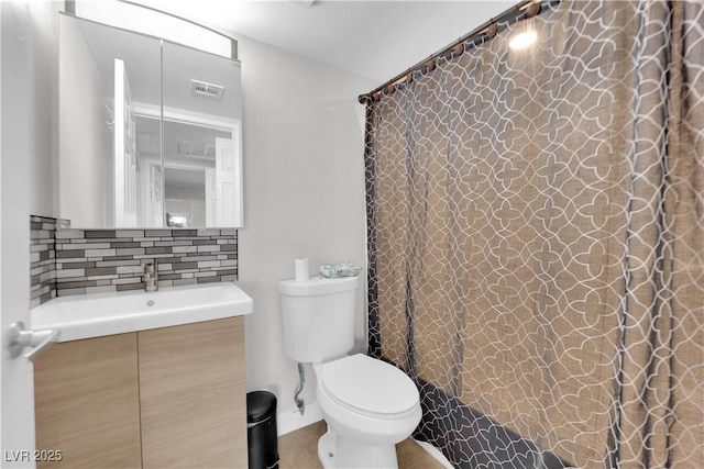 full bathroom with vanity, shower / tub combo, backsplash, and toilet