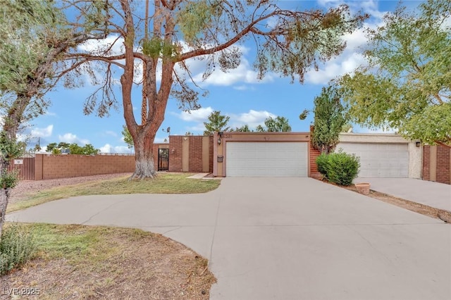 ranch-style house featuring a garage