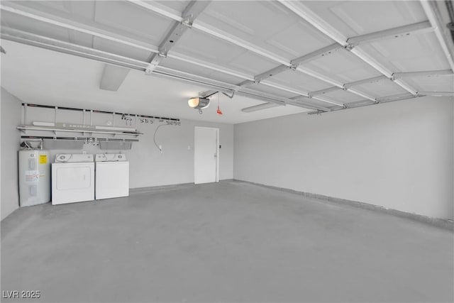 garage featuring electric water heater, washer and dryer, and a garage door opener