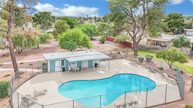 view of pool featuring a patio