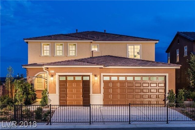 view of front of home with a garage