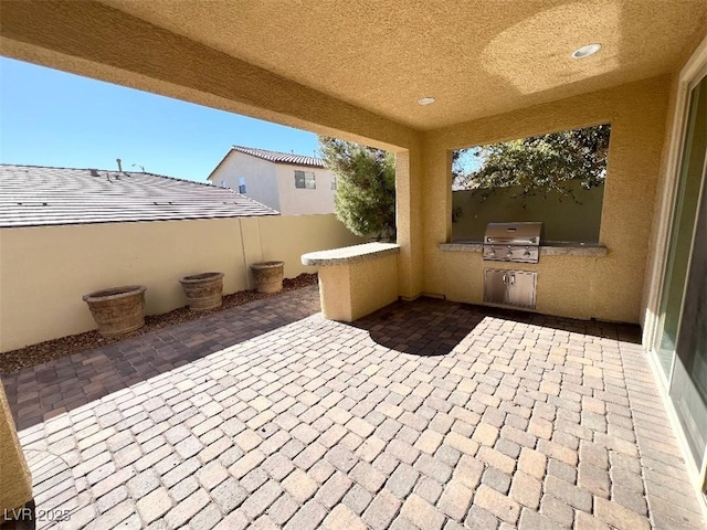 view of patio featuring area for grilling