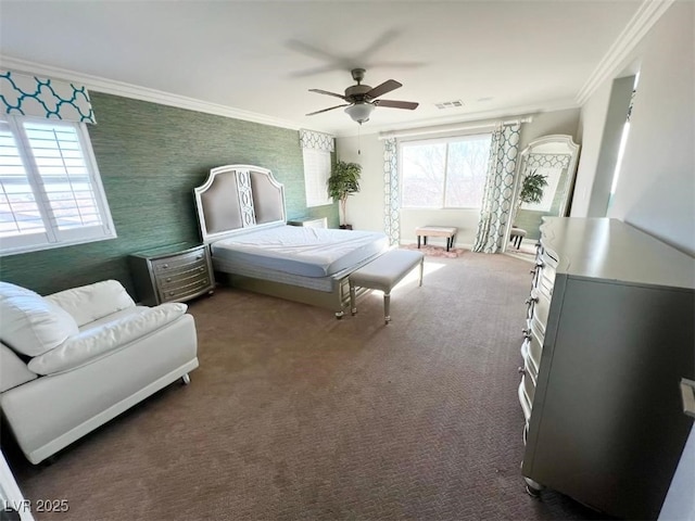 bedroom with ceiling fan, dark carpet, and multiple windows