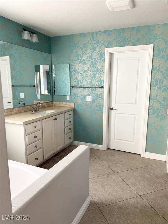 bathroom featuring vanity and tile patterned flooring