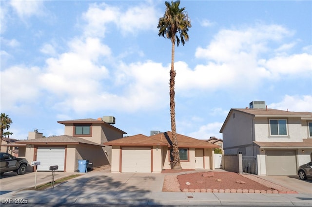 front facade with a garage