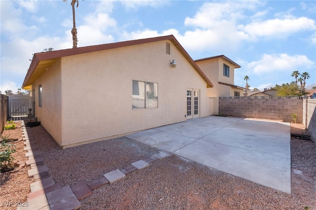 rear view of house with a patio area