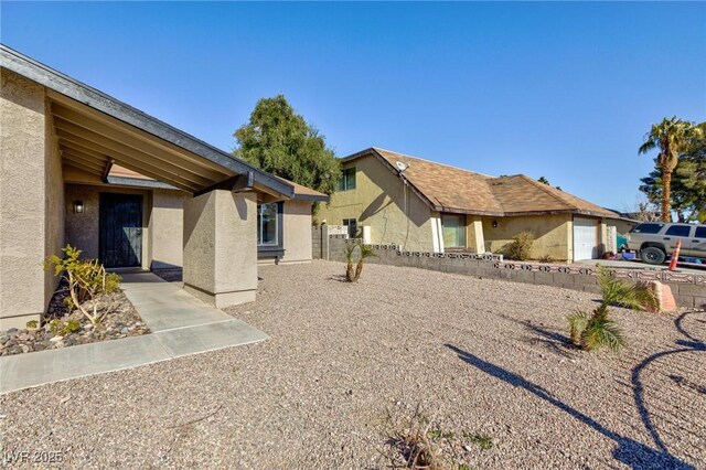 exterior space with a garage