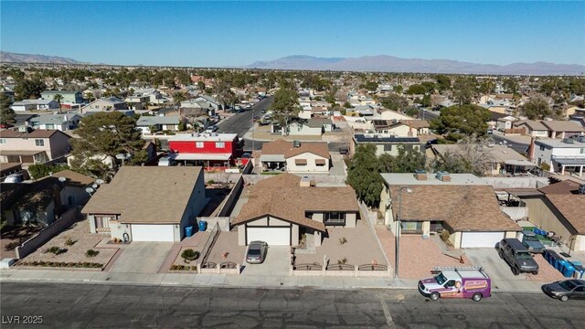 drone / aerial view featuring a mountain view