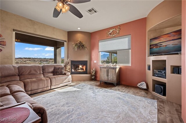 living room with ceiling fan