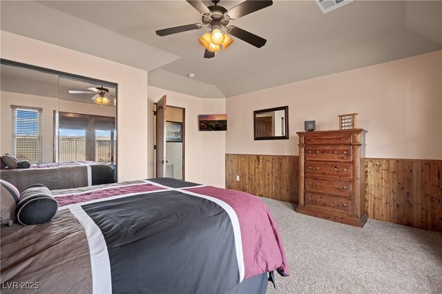 bedroom with carpet floors, a closet, and ceiling fan