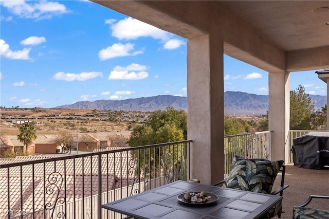 balcony featuring a grill and a mountain view