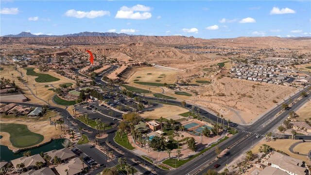 birds eye view of property with a mountain view