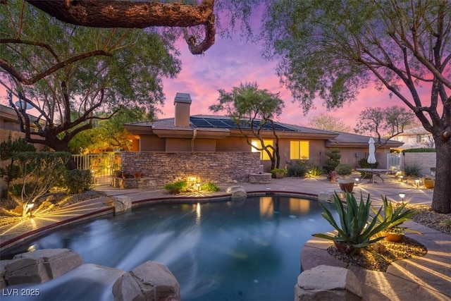 view of pool featuring a fenced in pool, a patio area, and fence