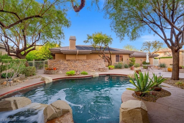 view of pool featuring a fenced in pool, a patio area, and fence