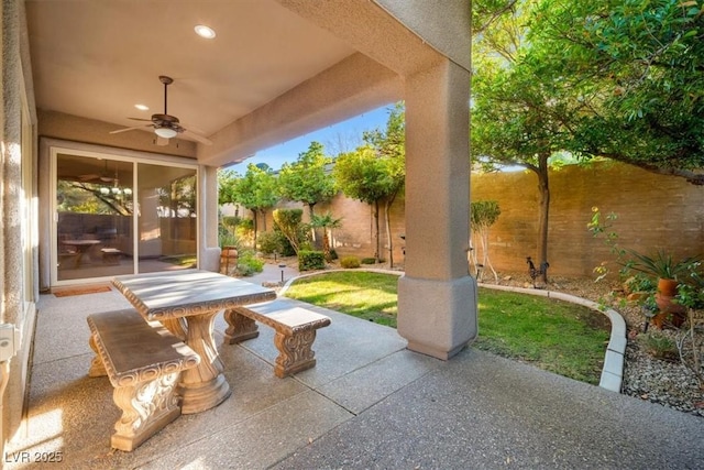 view of patio / terrace with a ceiling fan and a fenced backyard