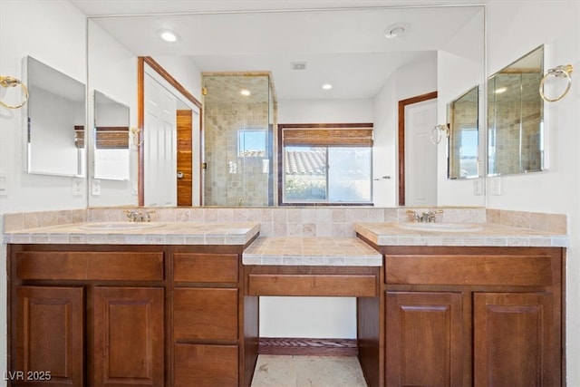 full bathroom featuring a stall shower, visible vents, vanity, and recessed lighting